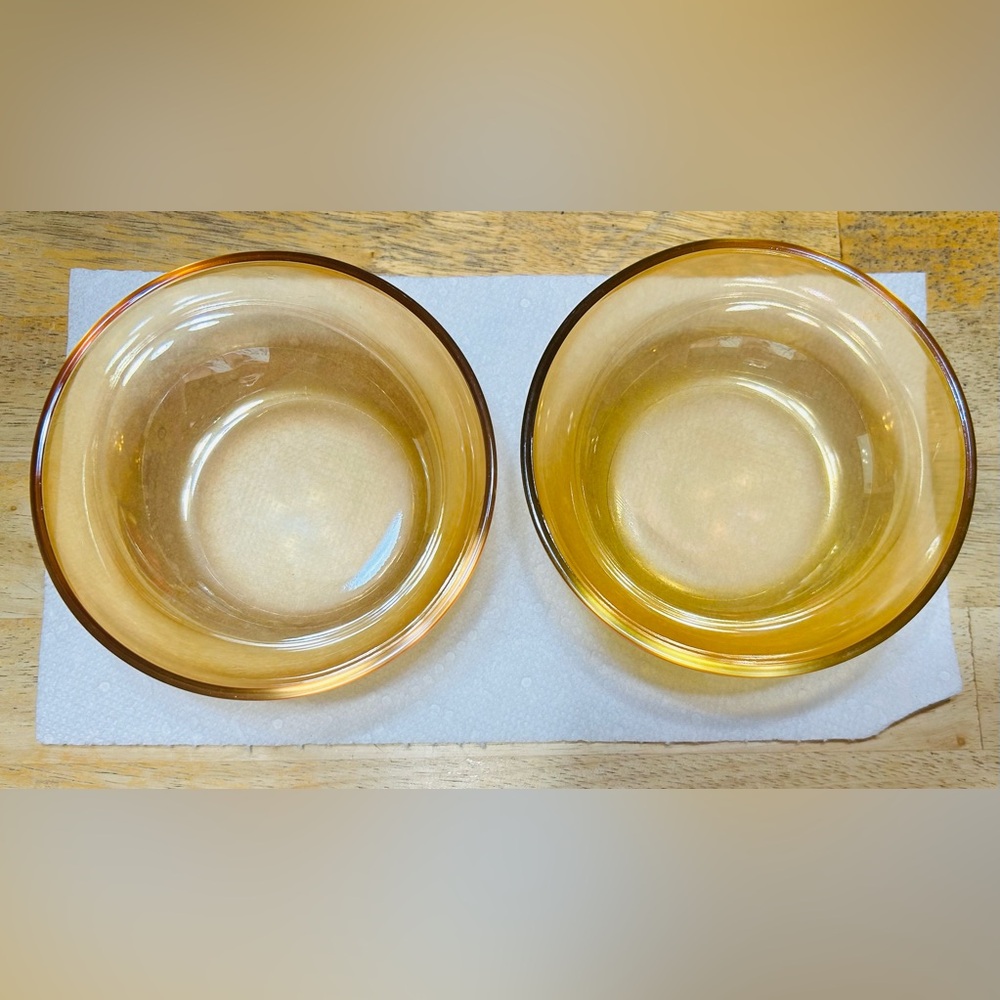 Vintage pair of iridescent marigold carnival glass small bowls.  Mint condition.